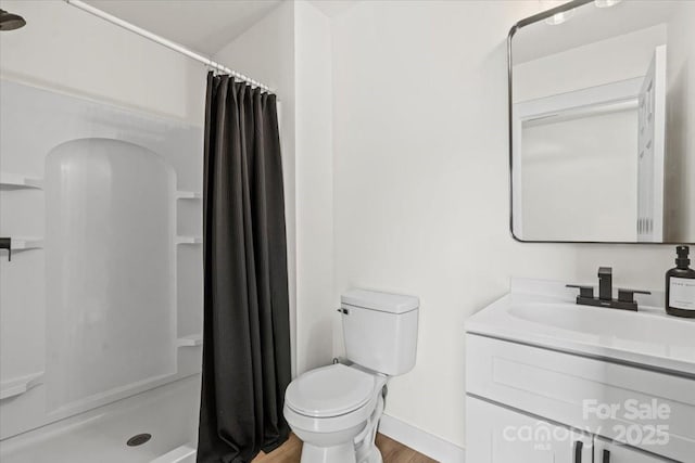 5740 Crouse Rd, Crouse, NC 28033 - bathroom featuring a shower with curtain, wood finished floors, and vanity