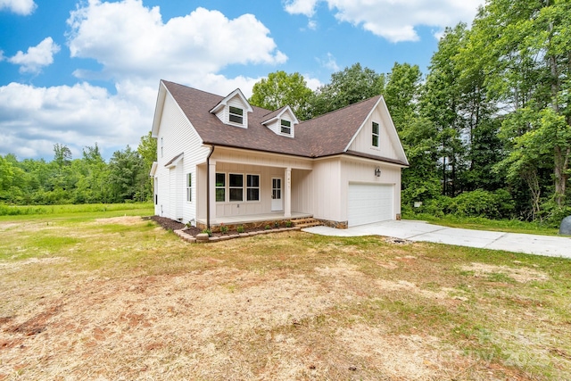 1471 Marshbrooke Ln, Catawba, NC 28609 - view of front of house featuring concrete driveway, a porch, a front lawn, and roof with shingles