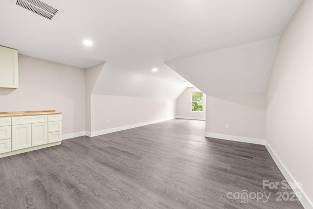 1471 Marshbrooke Ln, Catawba, NC 28609 - additional living space featuring wood finished floors, vaulted ceiling, and recessed lighting