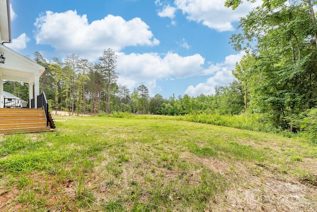 1471 Marshbrooke Ln, Catawba, NC 28609 - view of grassy yard with a view of trees and a deck
