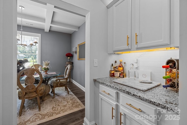 322 Ethan Ln, Rock Hill, SC 29732 - kitchen featuring dark wood-style floors, a chandelier, decorative backsplash, coffered ceiling, and beamed ceiling