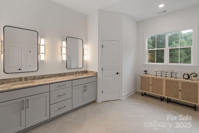 8283 Long Island Rd, Catawba, NC 28609 - bathroom featuring double vanity, tile patterned flooring, and recessed lighting