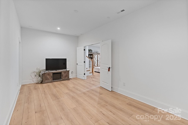 8283 Long Island Rd, Catawba, NC 28609 - unfurnished living room with light wood finished floors and recessed lighting