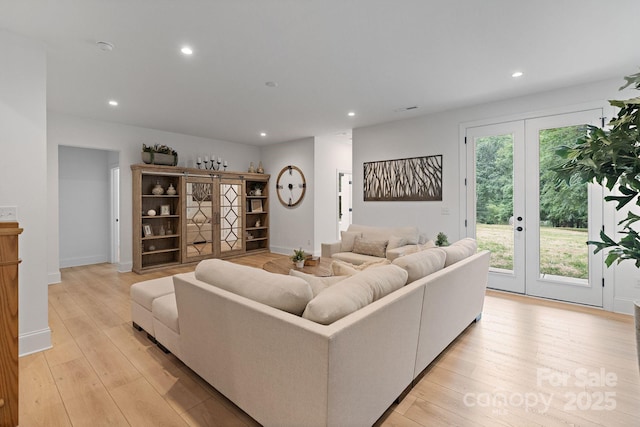 8283 Long Island Rd, Catawba, NC 28609 - living room with recessed lighting, french doors, and light wood-type flooring