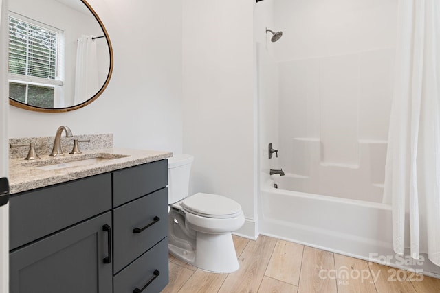 8283 Long Island Rd, Catawba, NC 28609 - full bath with vanity, wood finished floors, and shower / bath combo with shower curtain