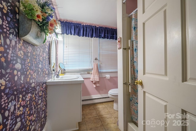 153 S Center St, Taylorsville, NC 28681 - bathroom with baseboard heating, vanity, tile patterned floors, toilet, and baseboards