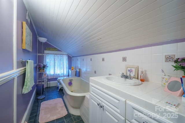 153 S Center St, Taylorsville, NC 28681 - full bathroom featuring vaulted ceiling, a freestanding tub, tile patterned floors, vanity, and wooden ceiling