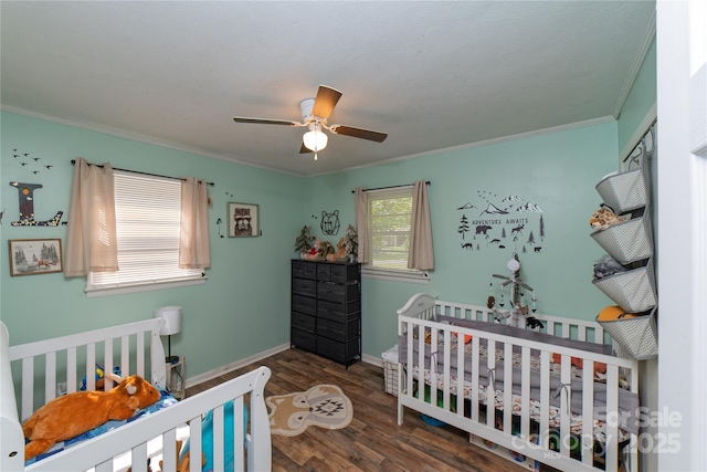 86 Pine Grove Dr, Andrews, NC 28901 - bedroom featuring ornamental molding, wood finished floors, a nursery area, and a ceiling fan
