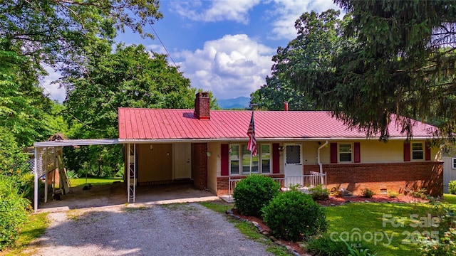 86 Pine Grove Dr, Andrews, NC 28901 - single story home featuring brick siding, an attached carport, a chimney, covered porch, and a metal roof