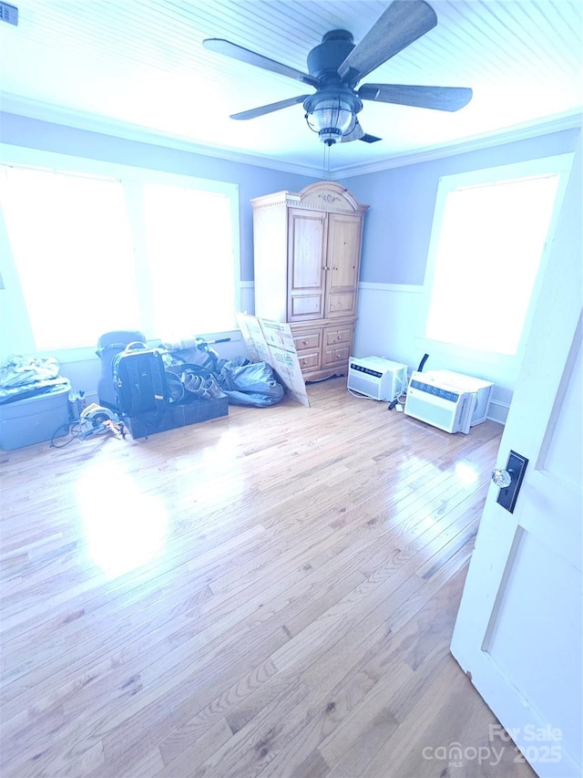 180 Vance Price Rd, Forest City, NC 28043 - unfurnished bedroom with light wood-style flooring, ceiling fan, and ornamental molding
