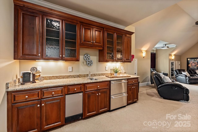 1500 Lookout Cir, Waxhaw, NC 28173 - kitchen with stainless steel dishwasher, light carpet, glass insert cabinets, light stone countertops, and open floor plan