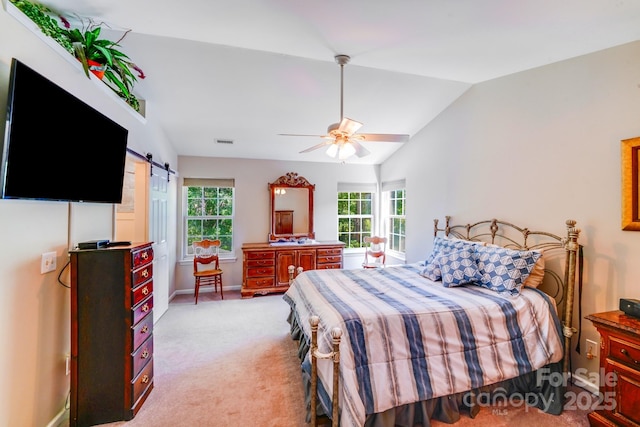 15811 Burlingame Dr, Huntersville, NC 28078 - bedroom featuring a barn door, lofted ceiling, light carpet, and ceiling fan