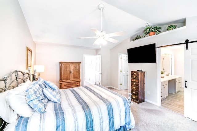 15811 Burlingame Dr, Huntersville, NC 28078 - bedroom featuring lofted ceiling, light carpet, a barn door, a ceiling fan, and ensuite bath