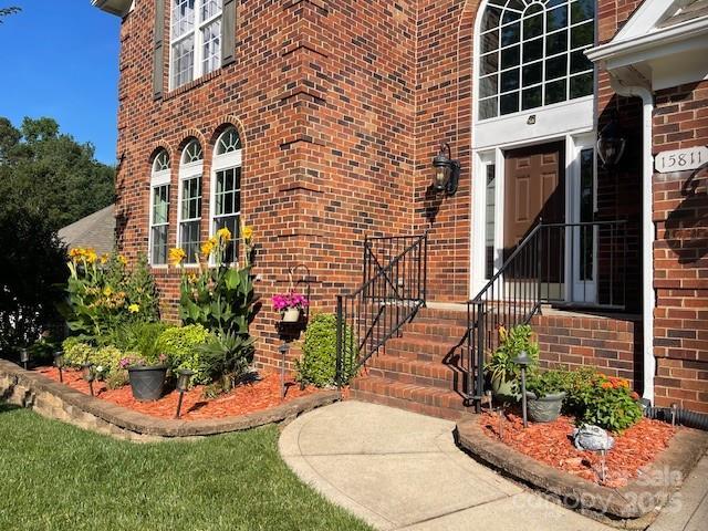 15811 Burlingame Dr, Huntersville, NC 28078 - view of exterior entry with brick siding