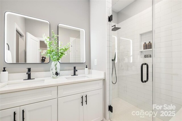 2003 Ashley Rd Unit B, Charlotte, NC 28208 - full bathroom featuring a stall shower and double vanity