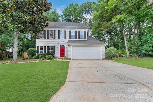 4000 Garfield Ct, Waxhaw, NC 28173 - colonial house with concrete driveway, a front yard, an attached garage, and roof with shingles