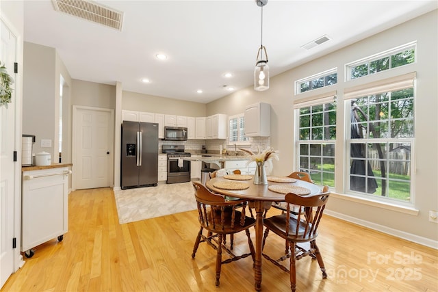 4000 Garfield Ct, Waxhaw, NC 28173 - dining room featuring light wood-type flooring and recessed lighting