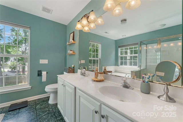 4000 Garfield Ct, Waxhaw, NC 28173 - full bathroom featuring double vanity, a stall shower, a garden tub, and a chandelier