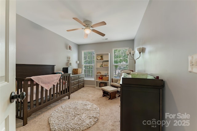 4000 Garfield Ct, Waxhaw, NC 28173 - bedroom with a nursery area, carpet, and a ceiling fan