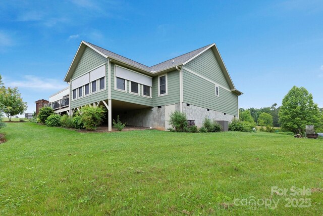 288 Ollie Weaver Rd, Weaverville, NC 28787 - view of side of home with a yard