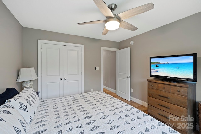 288 Ollie Weaver Rd, Weaverville, NC 28787 - bedroom featuring wood finished floors, a closet, and ceiling fan
