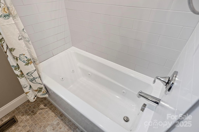 288 Ollie Weaver Rd, Weaverville, NC 28787 - bathroom featuring a combined bath / shower with jetted tub and baseboards