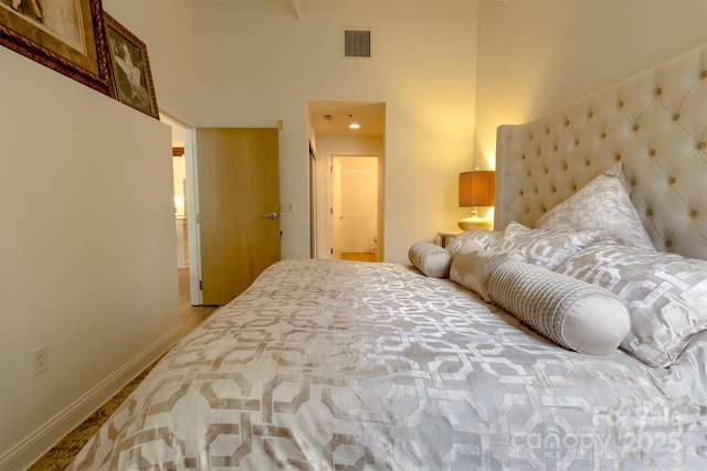 720 Governor Morrison St Unit 221, Charlotte, NC 28211 - bedroom with a towering ceiling and baseboards