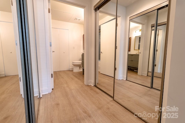 720 Governor Morrison St Unit 221, Charlotte, NC 28211 - corridor with light wood-style flooring and attic access