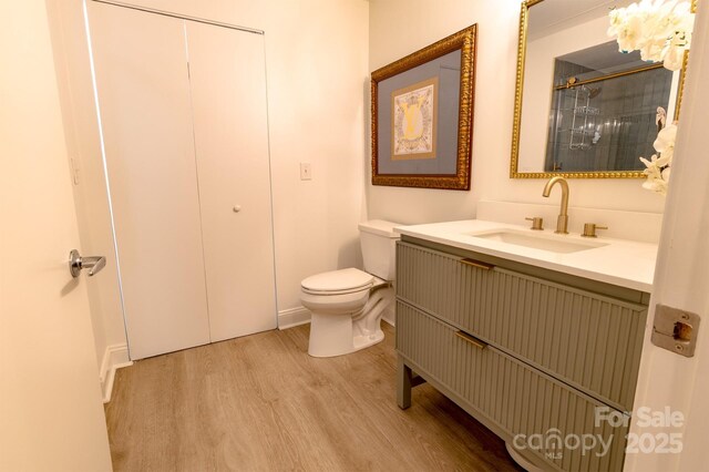 720 Governor Morrison St Unit 221, Charlotte, NC 28211 - bathroom with wood finished floors and vanity