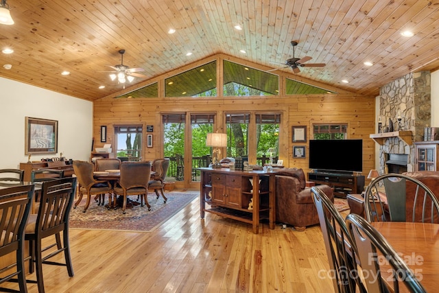 587 Grouse Thicket Rd, Mars Hill, NC 28754 - living room with ceiling fan, light wood finished floors, a stone fireplace, recessed lighting, and high vaulted ceiling
