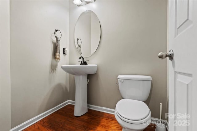 5111 Elementary View Dr, Charlotte, NC 28269 - bathroom featuring baseboards and wood finished floors