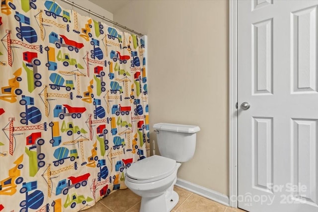 5111 Elementary View Dr, Charlotte, NC 28269 - bathroom featuring tile patterned floors and a shower with curtain