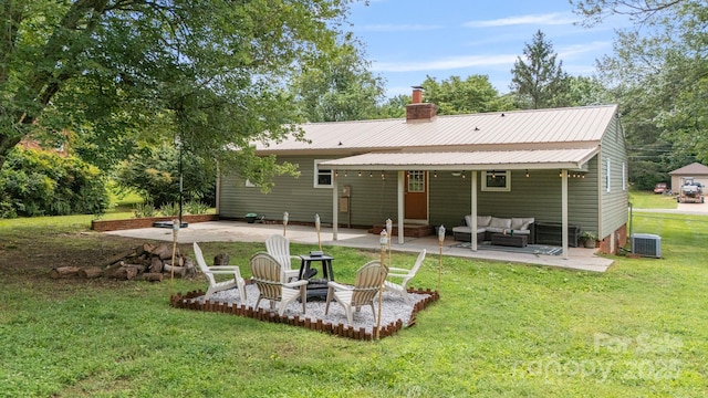 3980 English Oak Dr, Lincolnton, NC 28092 - rear view of house featuring an outdoor hangout area, a patio area, entry steps, a chimney, and a yard