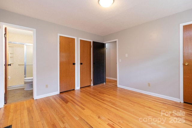 46 Dixon Ter Unit 12, Candler, NC 28715 - unfurnished bedroom with light wood-style flooring and ensuite bath