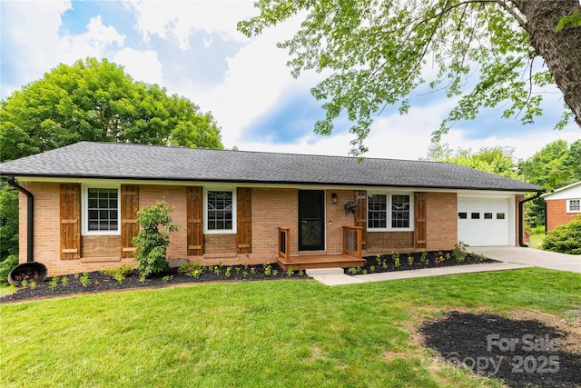 46 Dixon Ter Unit 12, Candler, NC 28715 - ranch-style house with a garage, brick siding, concrete driveway, a front lawn, and roof with shingles