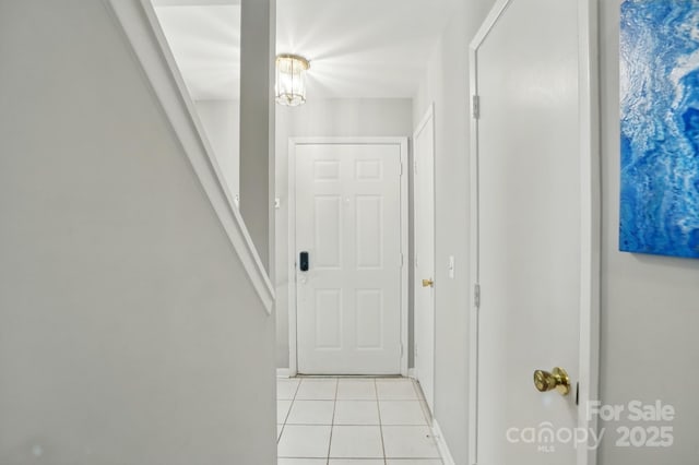 6044 Heath Valley Rd, Charlotte, NC 28210 - corridor featuring light tile patterned floors
