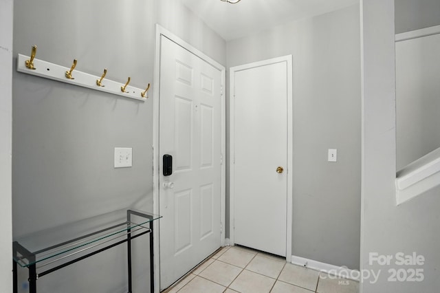 6044 Heath Valley Rd, Charlotte, NC 28210 - entryway featuring light tile patterned floors