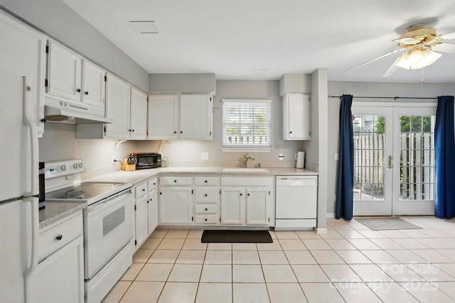 6044 Heath Valley Rd, Charlotte, NC 28210 - kitchen featuring white appliances, a sink, under cabinet range hood, white cabinets, and ceiling fan
