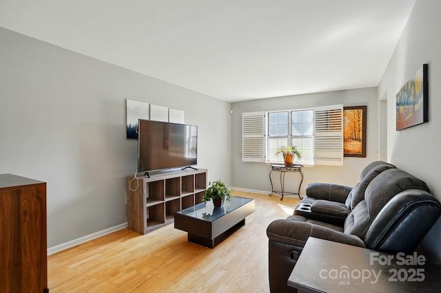 6044 Heath Valley Rd, Charlotte, NC 28210 - living room with light wood-style flooring and baseboards