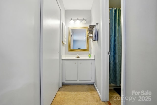6044 Heath Valley Rd, Charlotte, NC 28210 - bathroom featuring vanity, baseboards, and curtained shower
