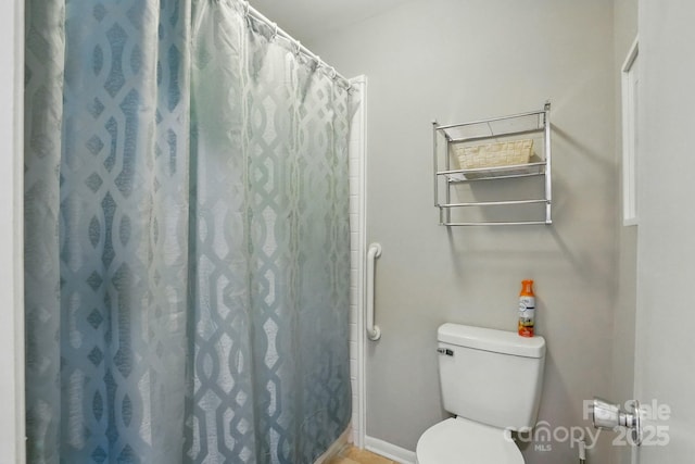 6044 Heath Valley Rd, Charlotte, NC 28210 - bathroom featuring toilet and curtained shower
