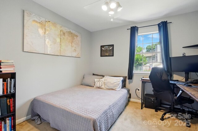 6044 Heath Valley Rd, Charlotte, NC 28210 - bedroom with carpet flooring, an office area, baseboards, and a ceiling fan