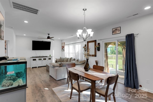 112 Aspire Cir, Wingate, NC 28174 - dining space featuring plenty of natural light, a ceiling fan, wood finished floors, a chandelier, and recessed lighting