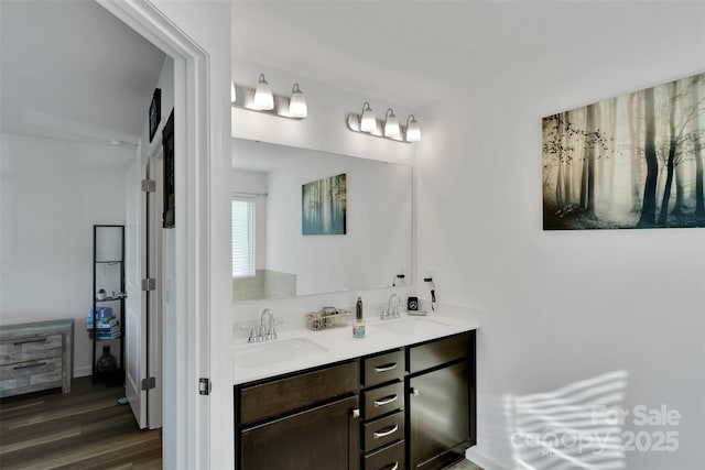 112 Aspire Cir, Wingate, NC 28174 - bathroom featuring double vanity and wood finished floors