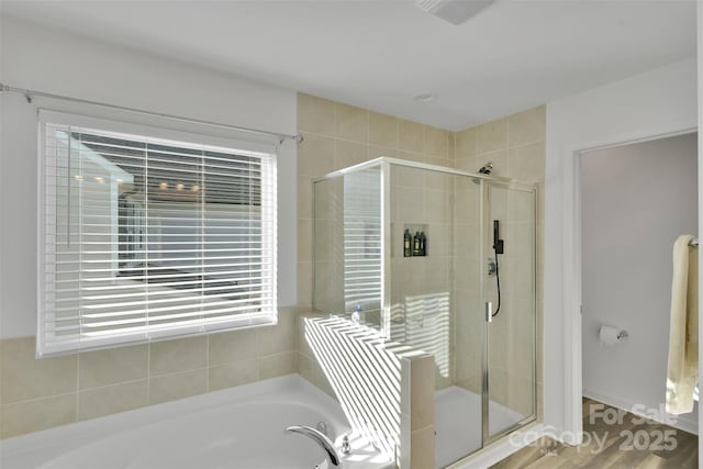 112 Aspire Cir, Wingate, NC 28174 - full bath featuring a shower stall and a garden tub