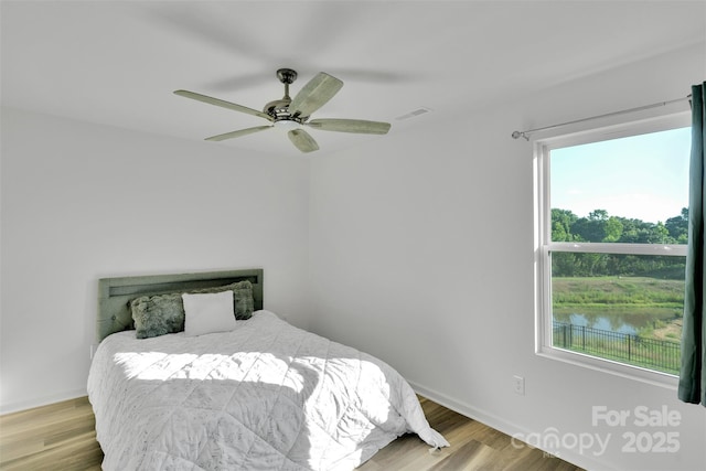 112 Aspire Cir, Wingate, NC 28174 - bedroom with wood finished floors and ceiling fan