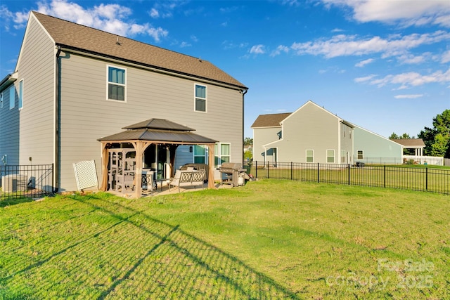 112 Aspire Cir, Wingate, NC 28174 - back of property featuring a gazebo, a patio area, and a fenced backyard