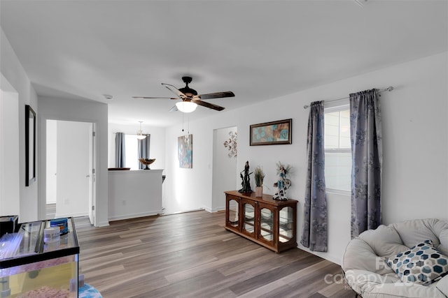 112 Aspire Cir, Wingate, NC 28174 - living room with healthy amount of natural light, wood finished floors, and a ceiling fan