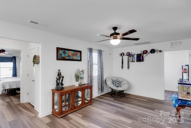 112 Aspire Cir, Wingate, NC 28174 - sitting room with ceiling fan and wood finished floors