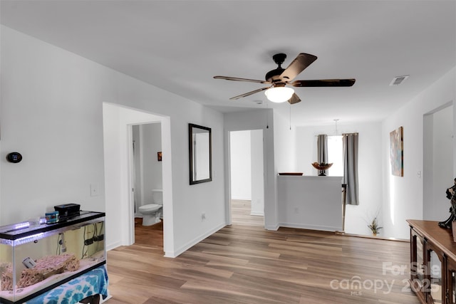 112 Aspire Cir, Wingate, NC 28174 - foyer entrance with a ceiling fan and wood finished floors